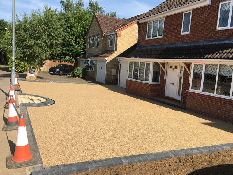 Gold aggregate resin driveway in Merseyside